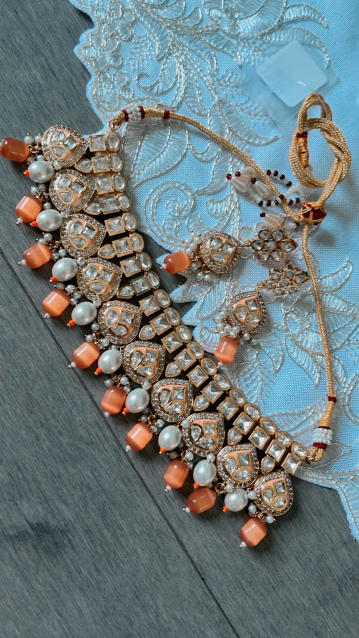 Tyaani rose gold base kundan set with earrings