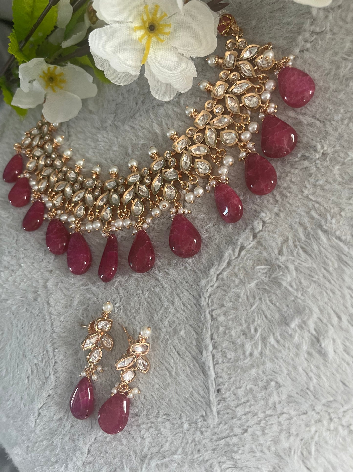 Tyaani rose gold base kundan set (necklace with earrings)